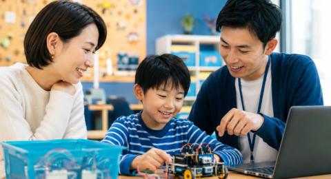 Parent observing a child during a coding class trial with an educator