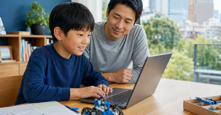Child balancing coding screen time with robotics and offline project planning